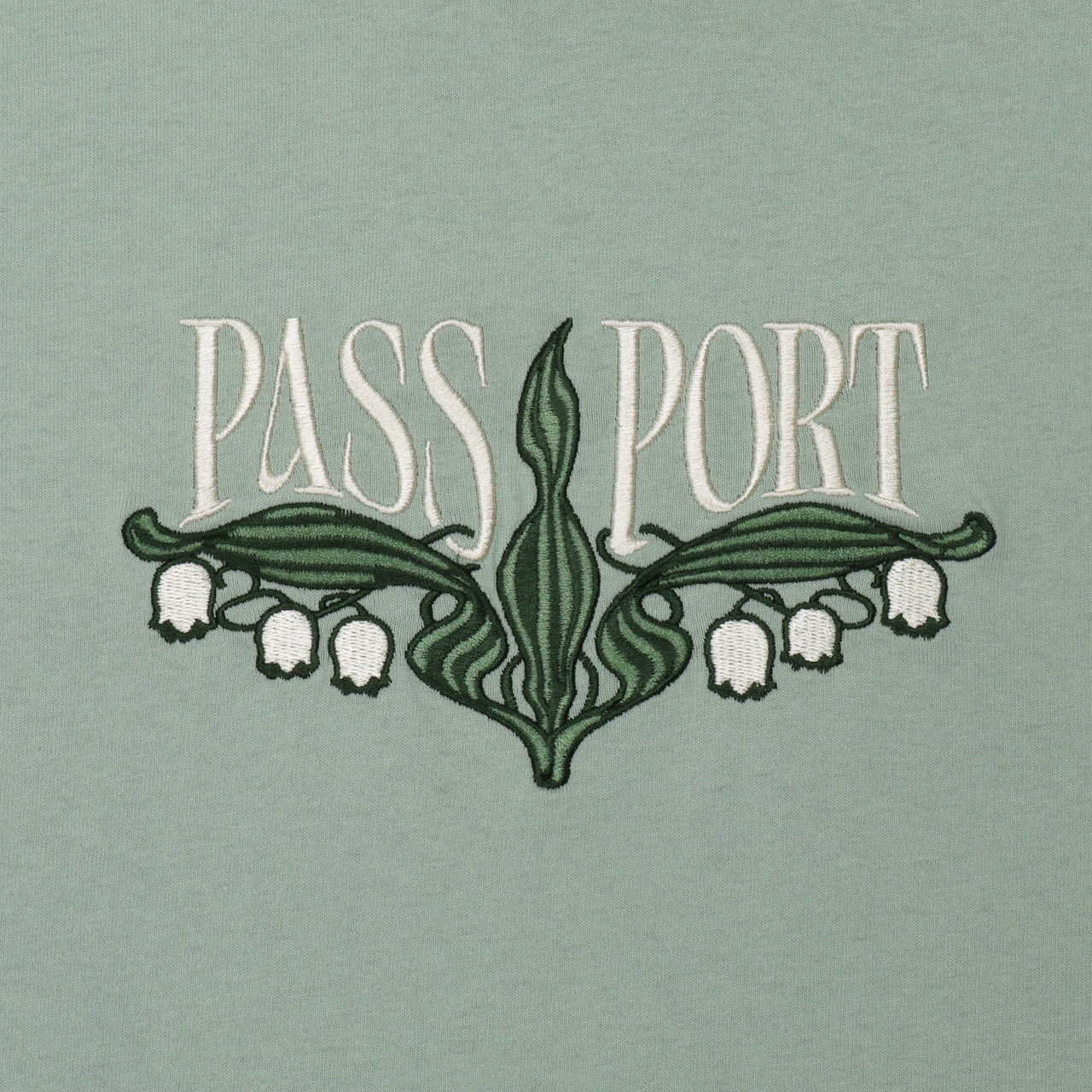 PASSPORT LILY OF THE VALLEY TEE STONEWASH GREEN