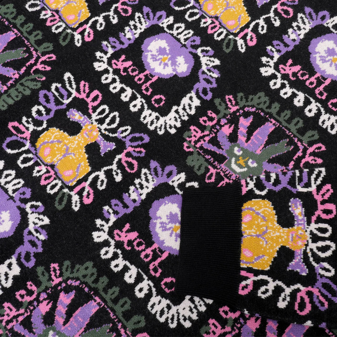 PASSPORT FACES KNIT SWEATER BLACK