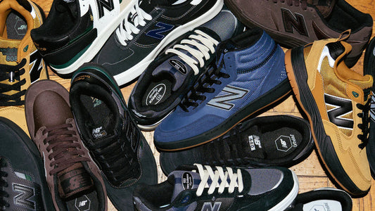 new balance numeric shoes scattered on the floor